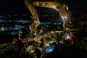 Informal miners search for jade in a slag heap near the town of Hpakant in northern Myanmar (Image © Hkun Lat)