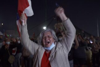 <p>A woman celebrates the victory of the campaign for a new constitution for Chile (image: Antonia Colodro)</p>