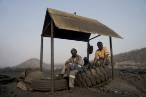 <p>Miners take a break at a Makomo Resources coal mine in Hwange. Makomo and Zambezi Gas are some of the newer players in Hwange’s coal-mining scene. (Image: <a href="https://www.kbmpofu.com/">KB Mpofu</a> / China Dialogue)</p>