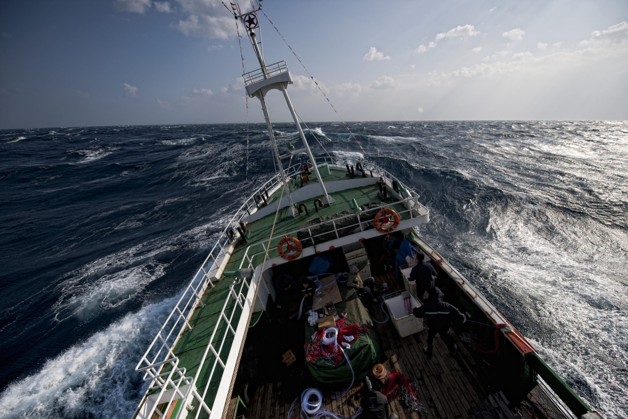 <p>The boat heads east into deeper and bluer water – and rougher waters. The boat swings back and forth. (Image: Stam Lee)</p>