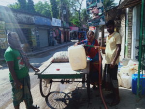 <p>Brajasundari buys water, a new experience in previously water-abundant Bangladesh, where salt water intrusion is affecting water sources [Image by: Riyan Talha]</p>