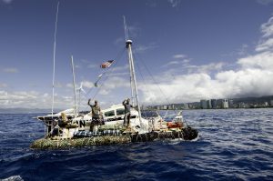<p>Marcus Eriksen and Joel Paschal assembled a raft out of 15,000 plastic bottles, part of an airplane fuselage, a few recycled shipping masts, and other rubbish before setting off on a three-month voyage (Image: Supplied)</p>