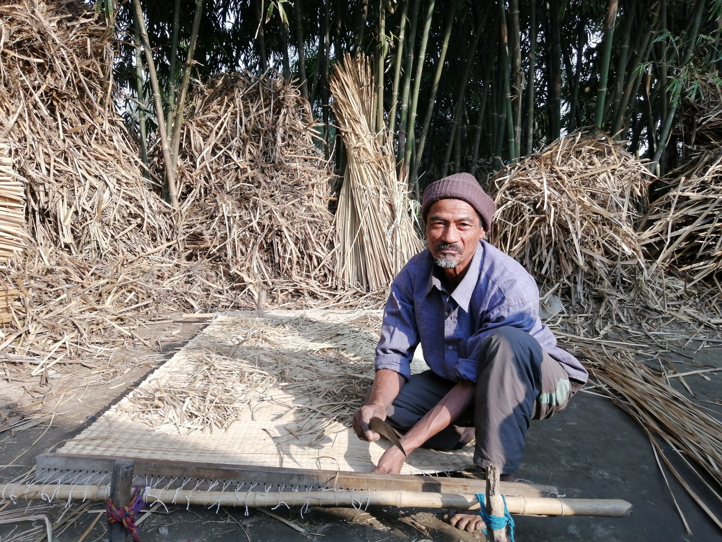 60-year-old Gulat Sardar is the husband of Shambhadevi Sardar. Both of them work to support the family [image by: Birat Anupam]