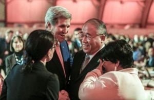 <p>The warm relationship between John Kerry and Xie Zhenhua was essential to the adoption of the Paris Agreement in 2015 (Image: Alamy)</p>