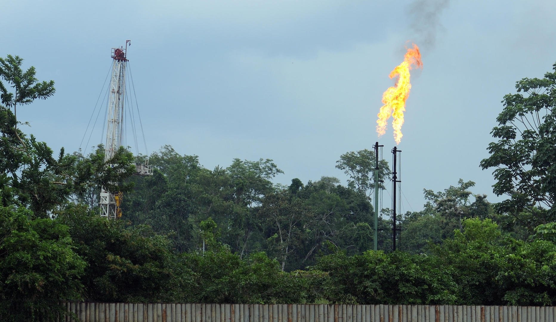 Natural gas flared at an oil processing plant 