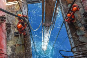 <p>Chinese workers drill for oil in the South China Sea (Image: Pu Xiaoxu / Alamy)</p>