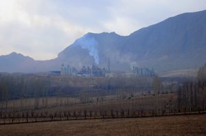 <p>Local residents say that poisonous substances are emitted from the Sinzhi-Pirim cement plant into the air, and get into soil and water, harming the local population’s health. (Image courtesy of the author)</p>
