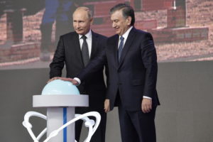 <p>Vladimir Putin, president of Russia, and Shavkat Mirziyoyev, president of Uzbekistan, press a symbolic button during a ceremony to mark the start of construction of Uzbekistan’s first nuclear power station in October 2018 (Image: Mikhail Metzel/TASS Credit: ITAR-TASS News Agency/Alamy Live News)</p>