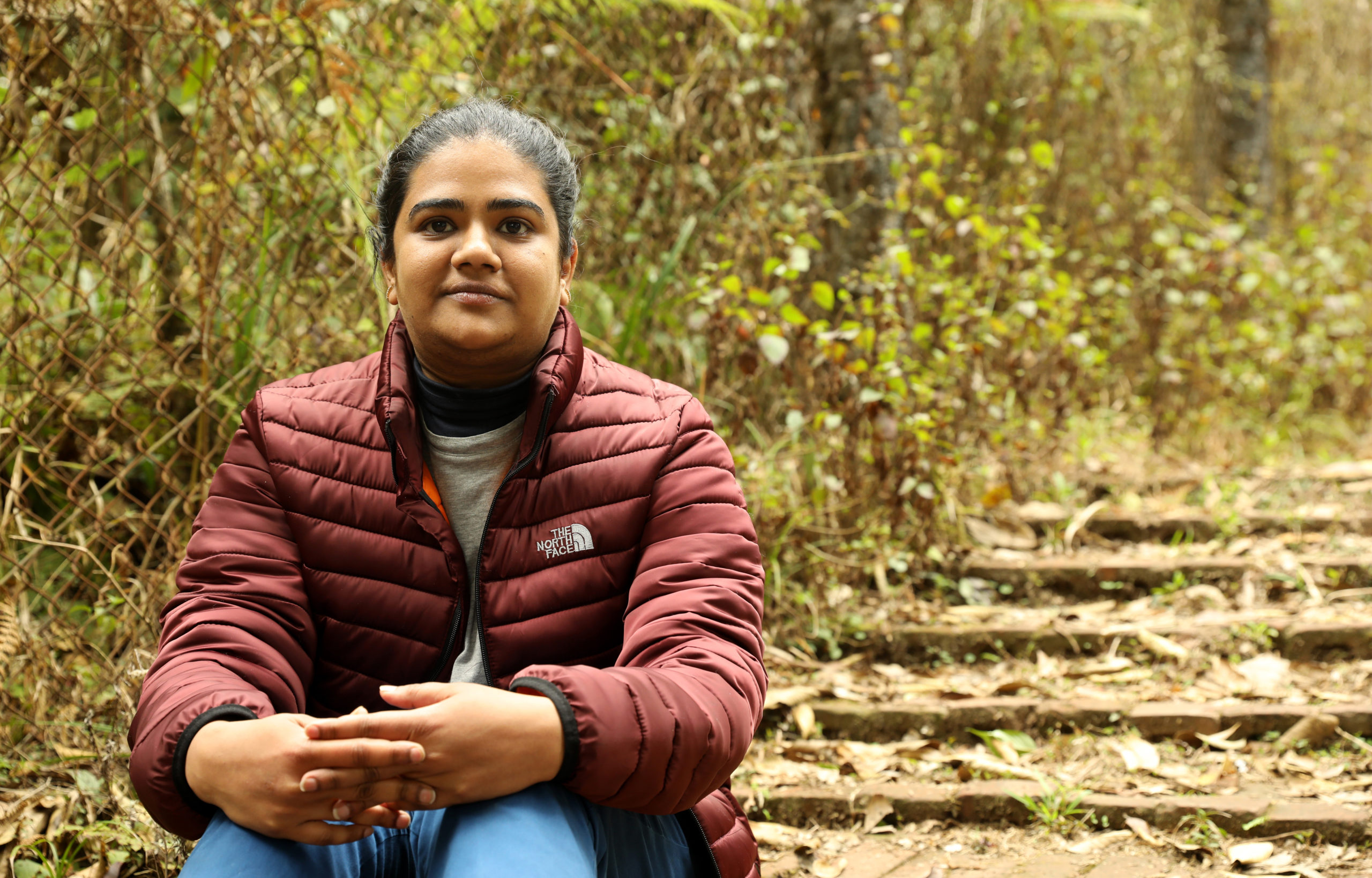 <p>Roshan Rathod in the field in South Sikkim (Image: Arijit Sen / The Third Pole)</p>