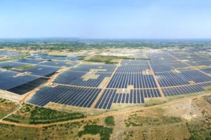 <p>An aerial view of Adani’s Kamuthi solar park in Tamil Nadu (Photo by Wikimedia Commons)</p>