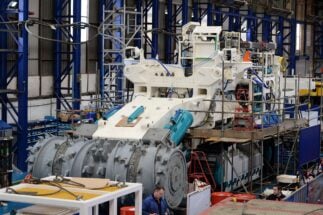 Employees of Soil Machine Dynamics (SMD) work on a subsea mining machine being built