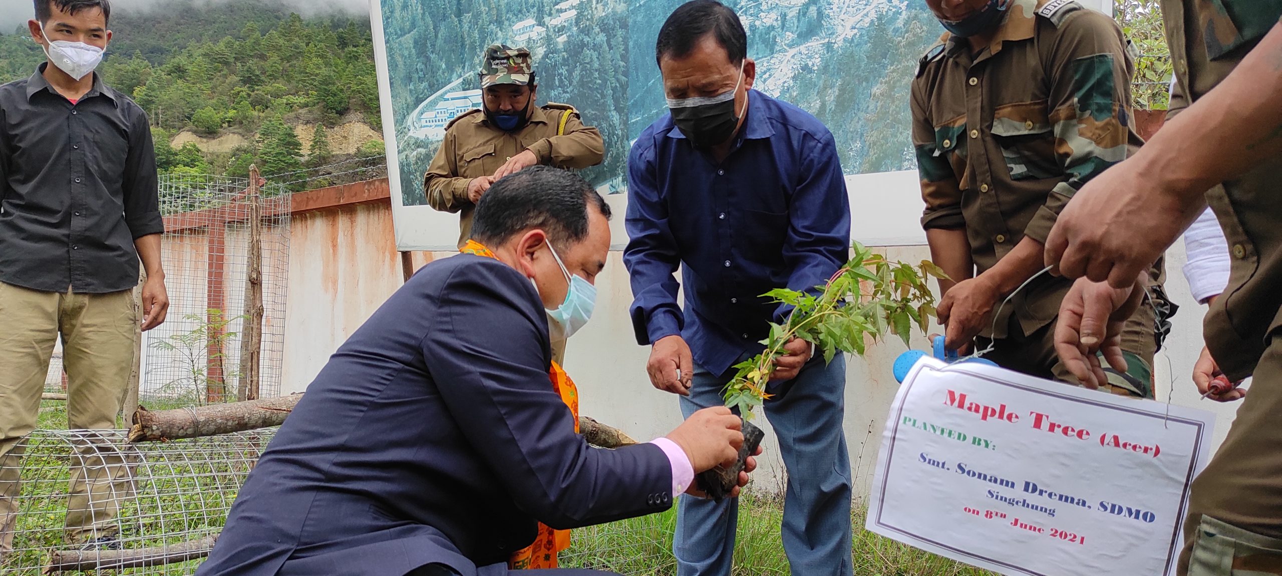 Local administrator and the chairperson of the SBVCR management committee on a tree-planting drive outside the community reserve (Image: Shaleena Phinya)