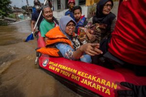 <p>Flooding in South Jakarta, Indonesia. There have been calls from climate-vulnerable countries for the UK to lift the barriers to COP26 entry for their delegates and civil society. (Image: © Greenpeace / Sahrul Manda Tikupadang)</p>