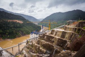 <p>Construction site of the Nam Theun 1 hydropower project in Laos. New research has shed light on the various environmental and social risks posed by Chinese-funded overseas development projects (Image: Kaikeo / Alamy)</p>
