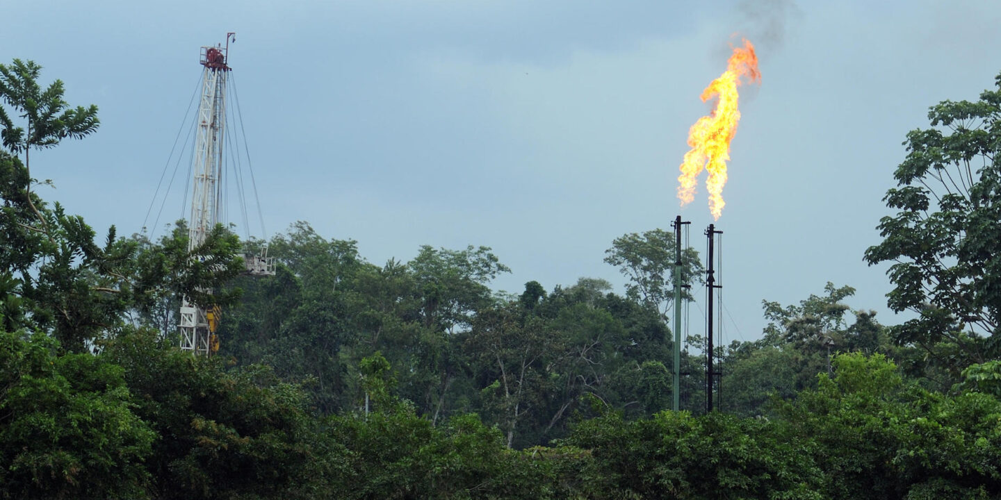 Unwanted natural gas is burnt at an oil processing plant on the Napo River near Coca and the Yasuní National Park in Ecuador’s Amazon