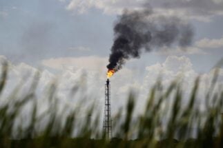 A flare stack burns at a refinery belonging to Pemex