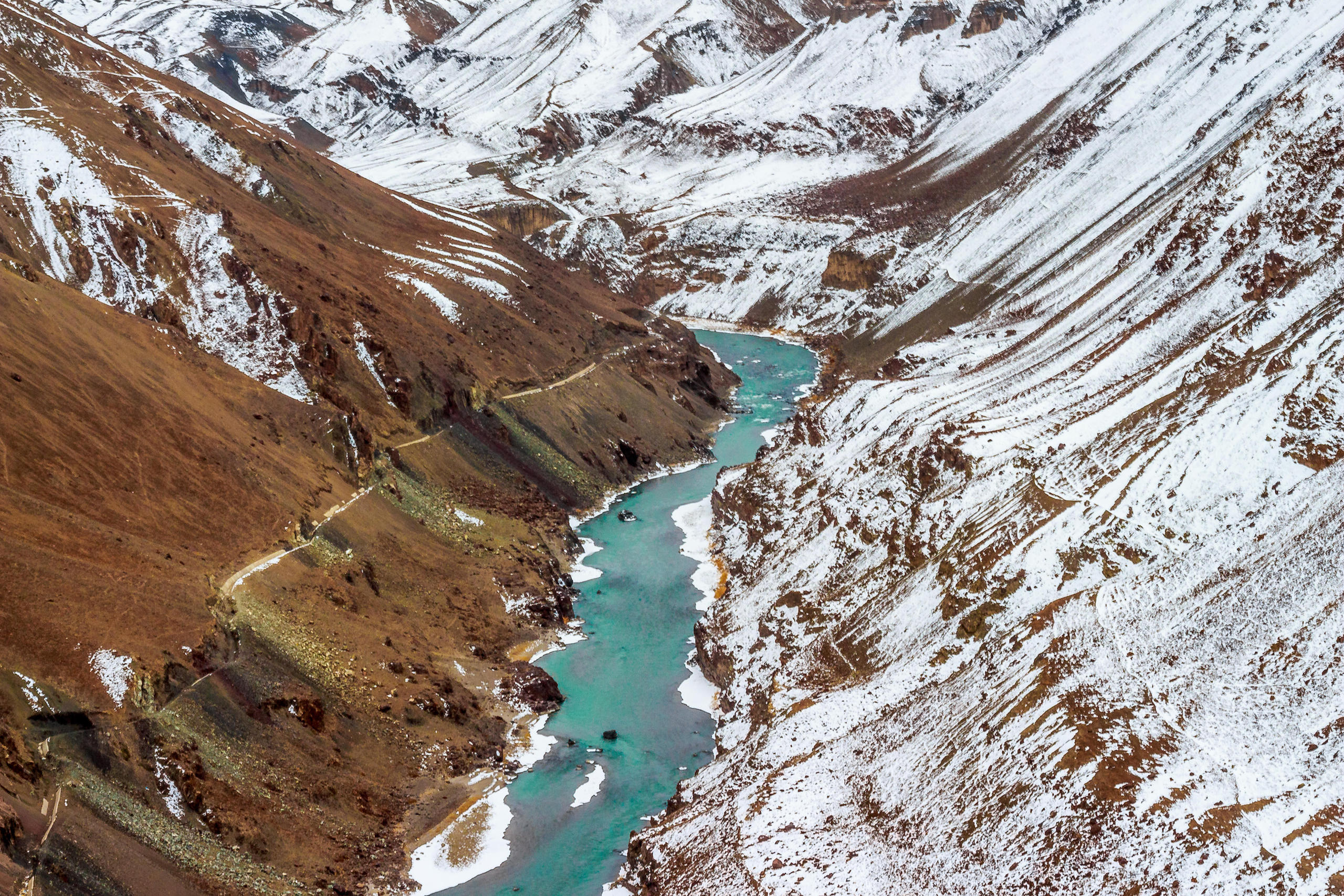 <p>The Indus River flows between the snow capped mountains of the Ladakh Range of the Himalayas. The authors of ‘Governing the “Water Tower of Asia”’ have developed a concept they call ‘System of Integrated Knowledge (SINK)’ – a more holistic approach to water that balances its multiple uses and creates a new system for water knowledge (Image: Parvesh Jain / Alamy)</p>