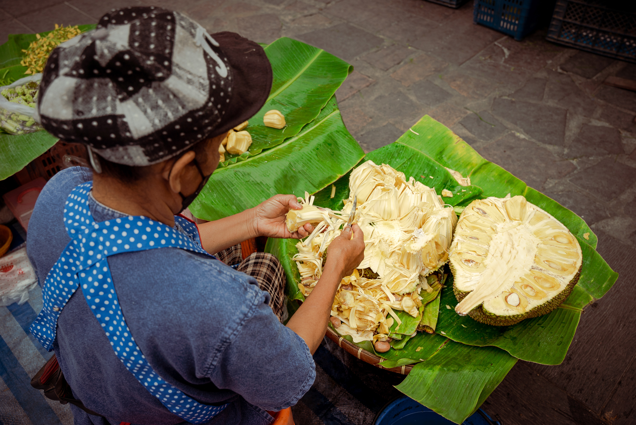 jackfruit displayed on banana leaves