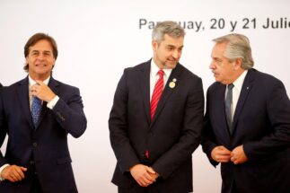 <p>Uruguay’s president Luis Lacalle Pou (left) at the Mercosur summit in Asunción, 21 July. His desire to seek a free trade deal with China has caused tensions, with Mario Abdo of Paraguay (centre) and Alberto Fernández of Argentina (right) calling for regional unity in response (Image: Cesar Olmedo / Alamy)</p>