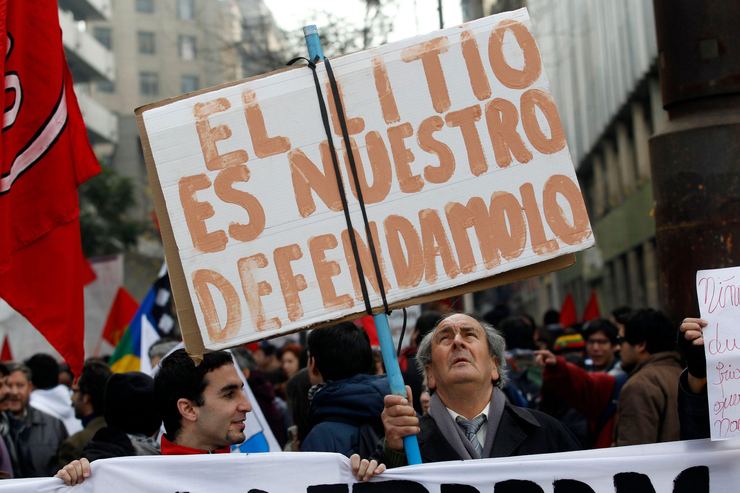 <p>A protester holds a sign reading &#8220;Lithium is ours, let&#8217;s defend it&#8221; at a protest in Santiago, Chile. Chile is one of the countries of the so-called &#8220;lithium triangle&#8221;, and the nationalisation of its exploration and exploitation was one of the campaign promises of president Gabriel Boric. (Image: Ivan Alvarado/Alamy)</p>