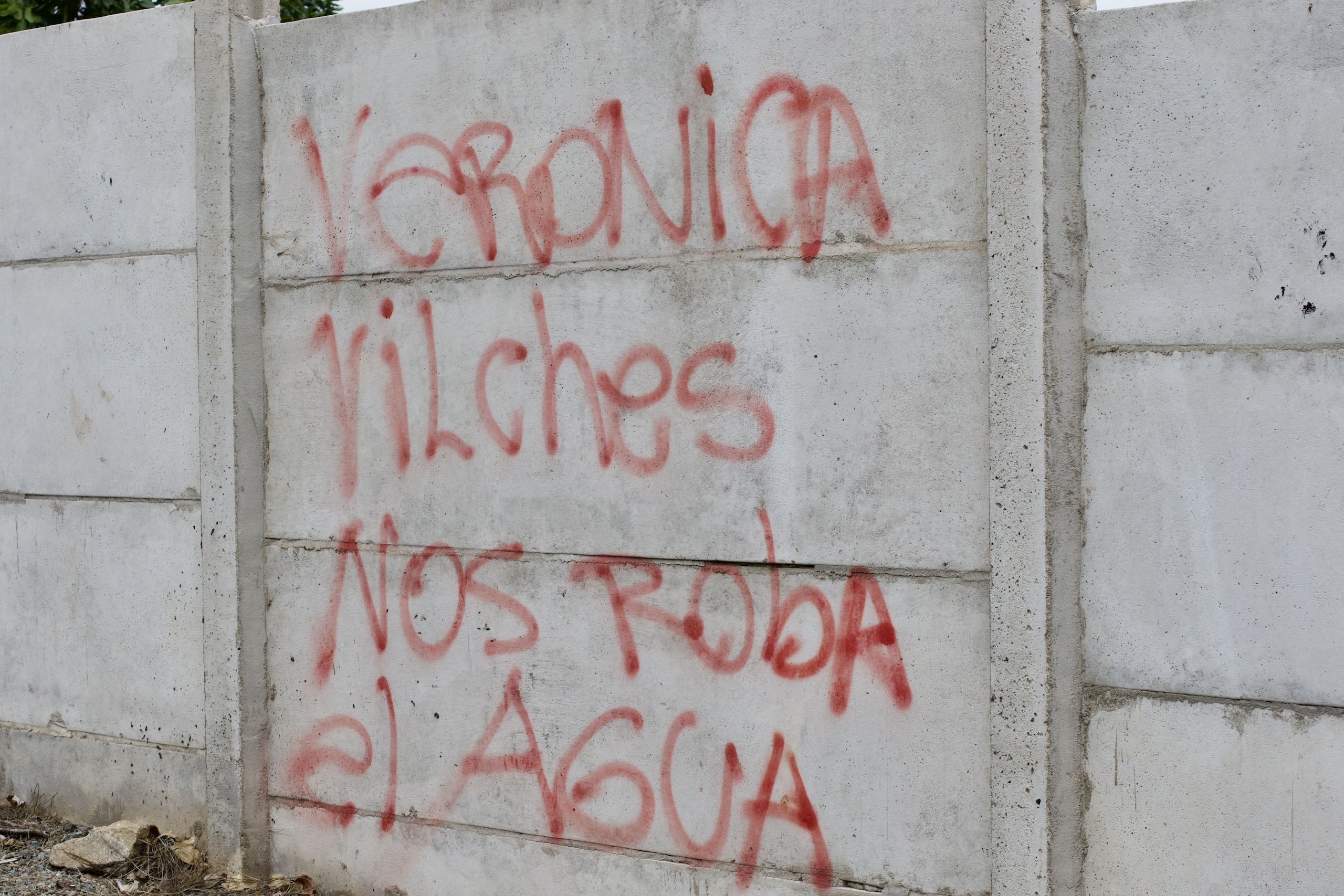 A message on a wall in Petorca accuses the leader of a local water committee