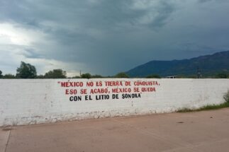 <p>A slogan on a wall in Bacadéhuachi, Sonora state, reads ‘Mexico is not a conquered land, that’s over, Mexico keeps the lithium from Sonora’. There has been great attention on the state’s lithium reserves, but slow progress in exploiting them (Image: Ann Deslandes / Diálogo Chino)</p>