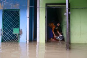 <p>Flooding in the district of Sylhet, Bangladesh, in June 2022. Urban flooding after heavy rainfall is common, as conventional drains can quickly become clogged with silt. To combat this, engineers are using new materials in drainage systems. (Image: Suvra Kanti Das / Alamy)</p>