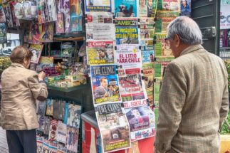 <p>A newspaper stand in Santiago, Chile. Latin American media’s coverage of the energy transition has been found to have gaps, biases and resource constraints (Image: Jose Giribas / Süddeutsche Zeitung Photo / Alamy)</p>