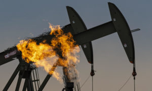 <p>A lot of methane is emitted while “flaring”, or burning waste gas, during fossil fuel extraction. In June this year, 10 countries and the EU pledged to end routine flaring by 2030. (Image: Zuma / Alamy)</p>
