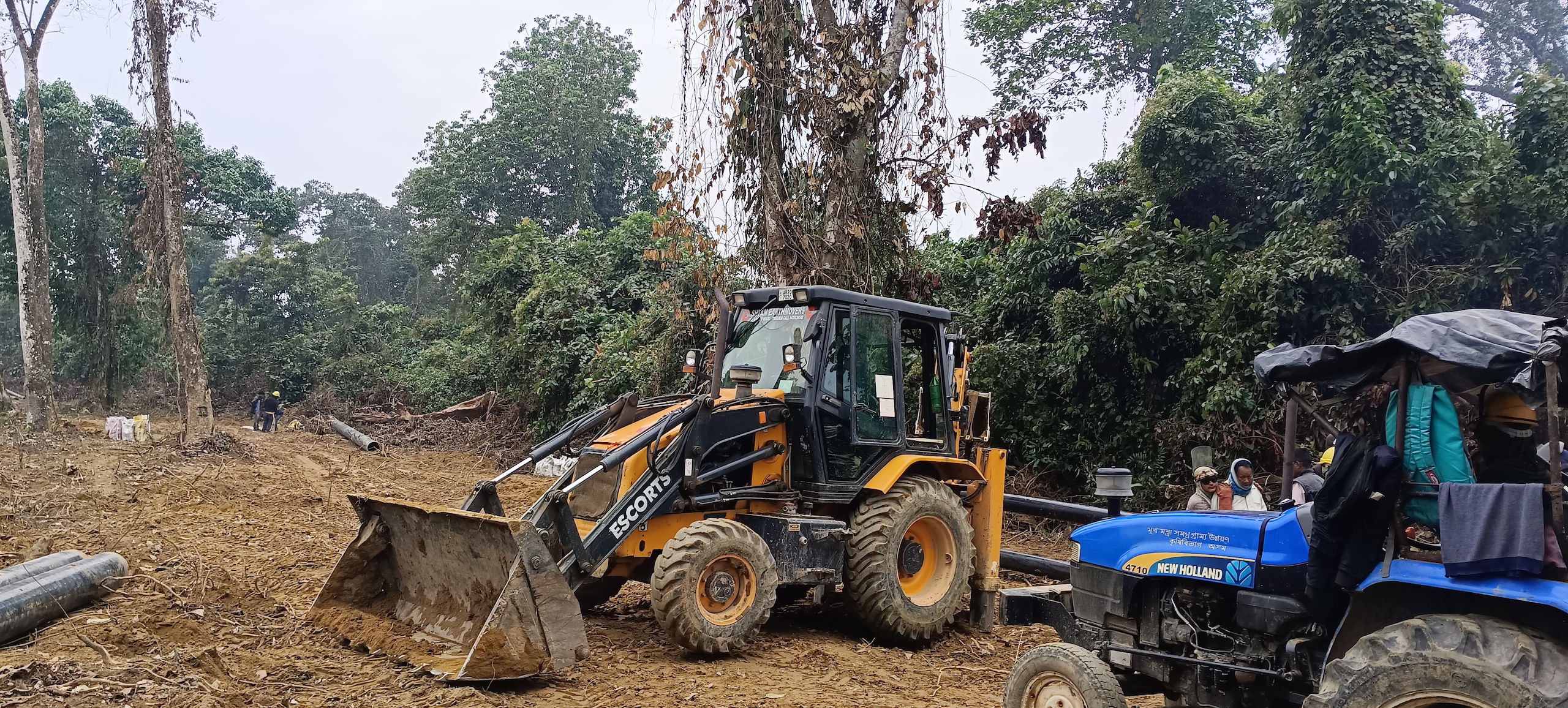A digger moves soil to make way for an oil pipeline