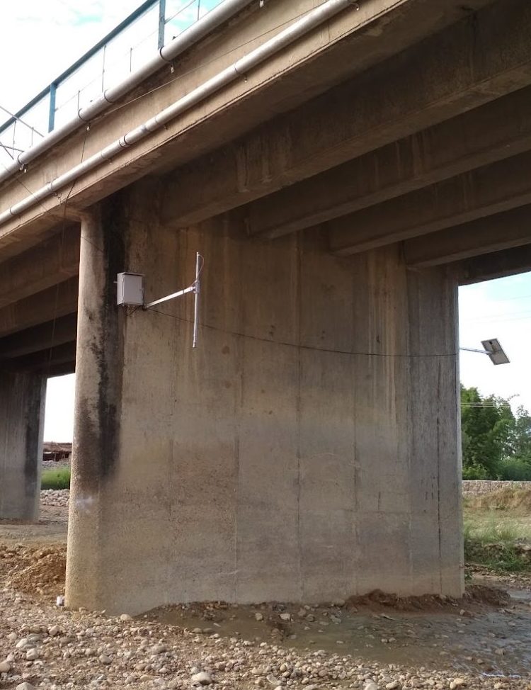 A sensor installed on a bridge over the Ratu River