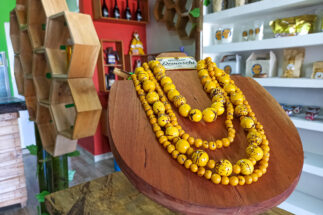 yellow layered beaded necklace on display