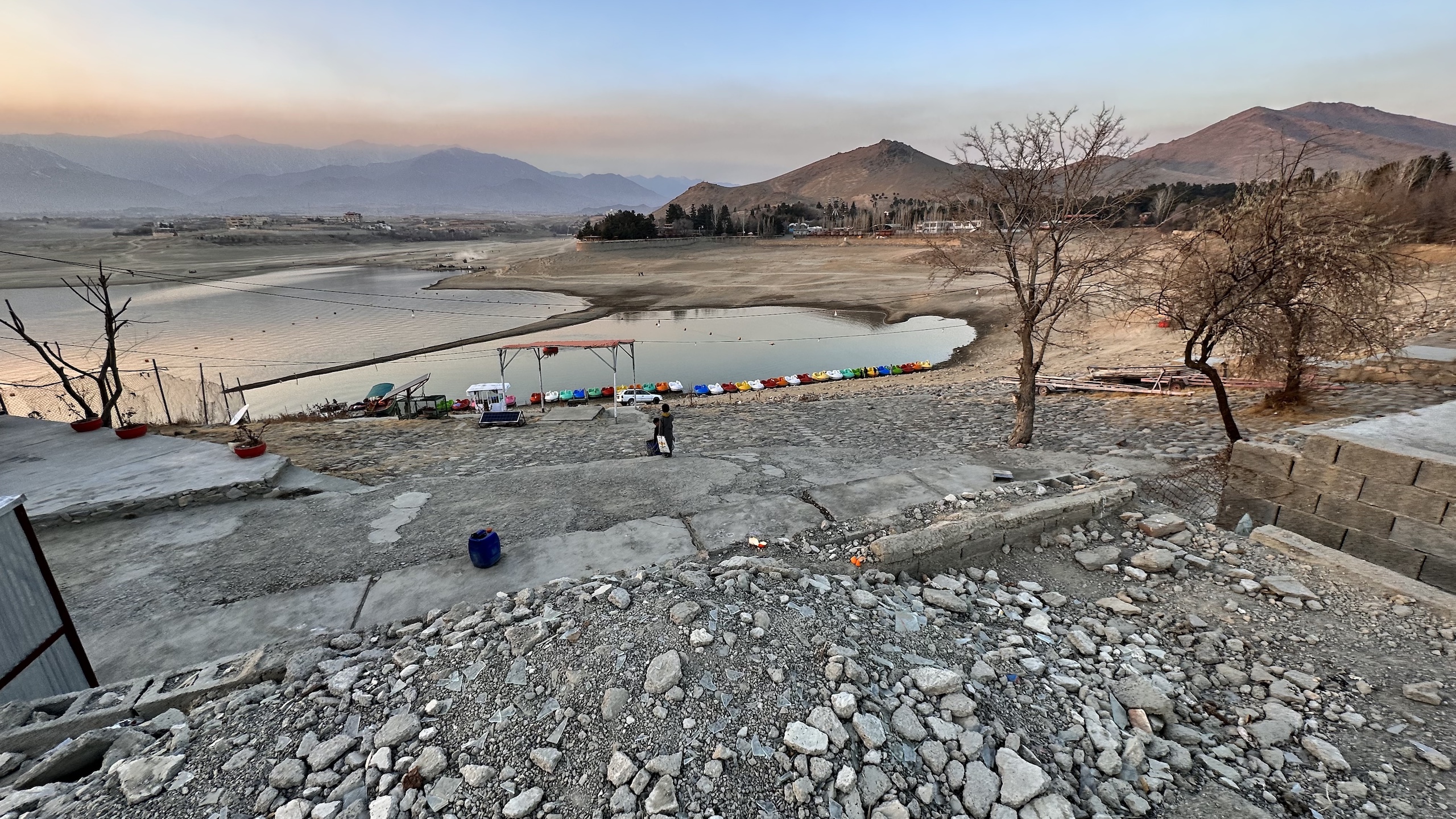 A fleet of swan-shaped boats sits on Qargha Lake