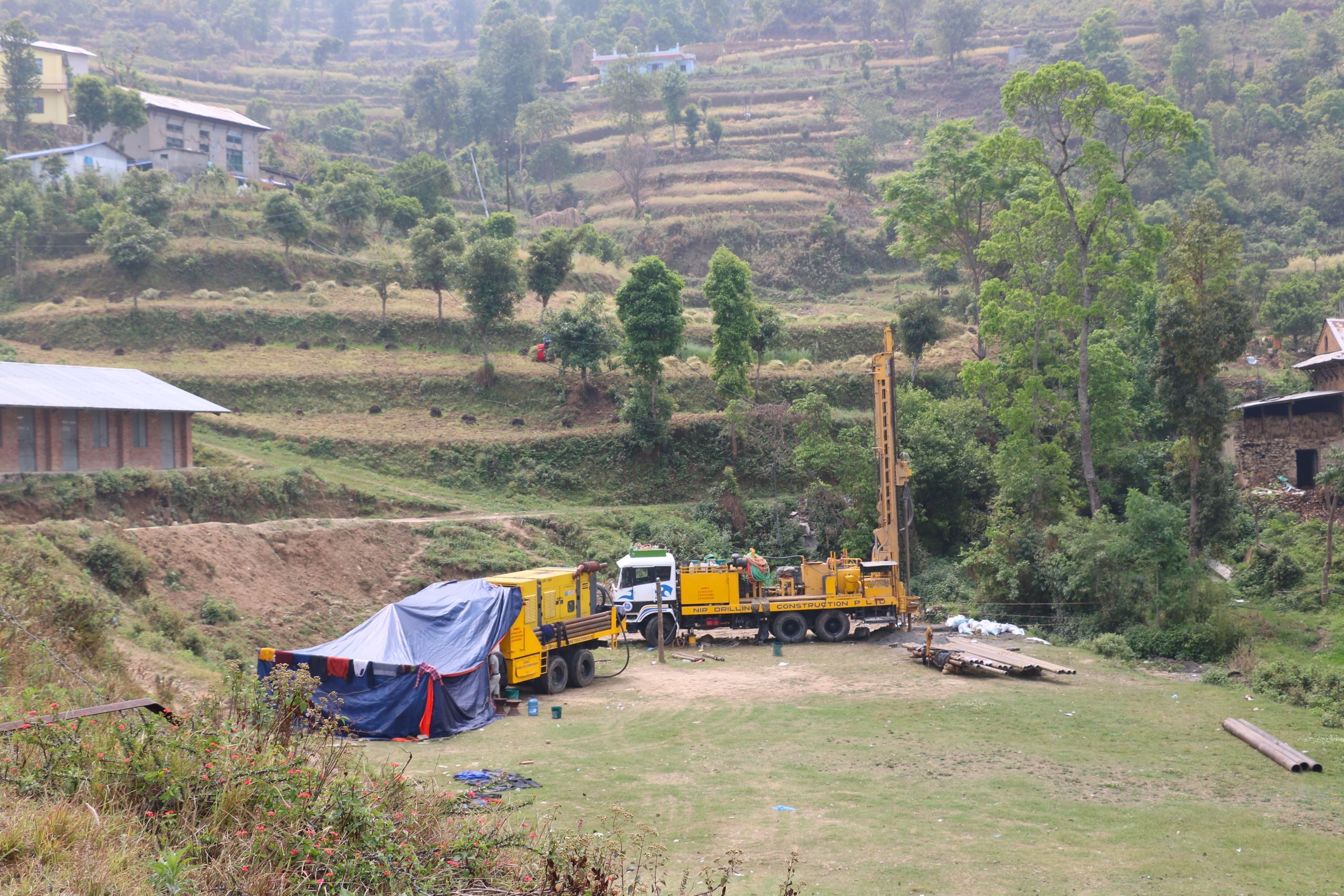 <p>A new deep bore well is constructed to provide water in a hilly municipality in Nepal (Image: Southasia Institute of Advanced Studies)</p>