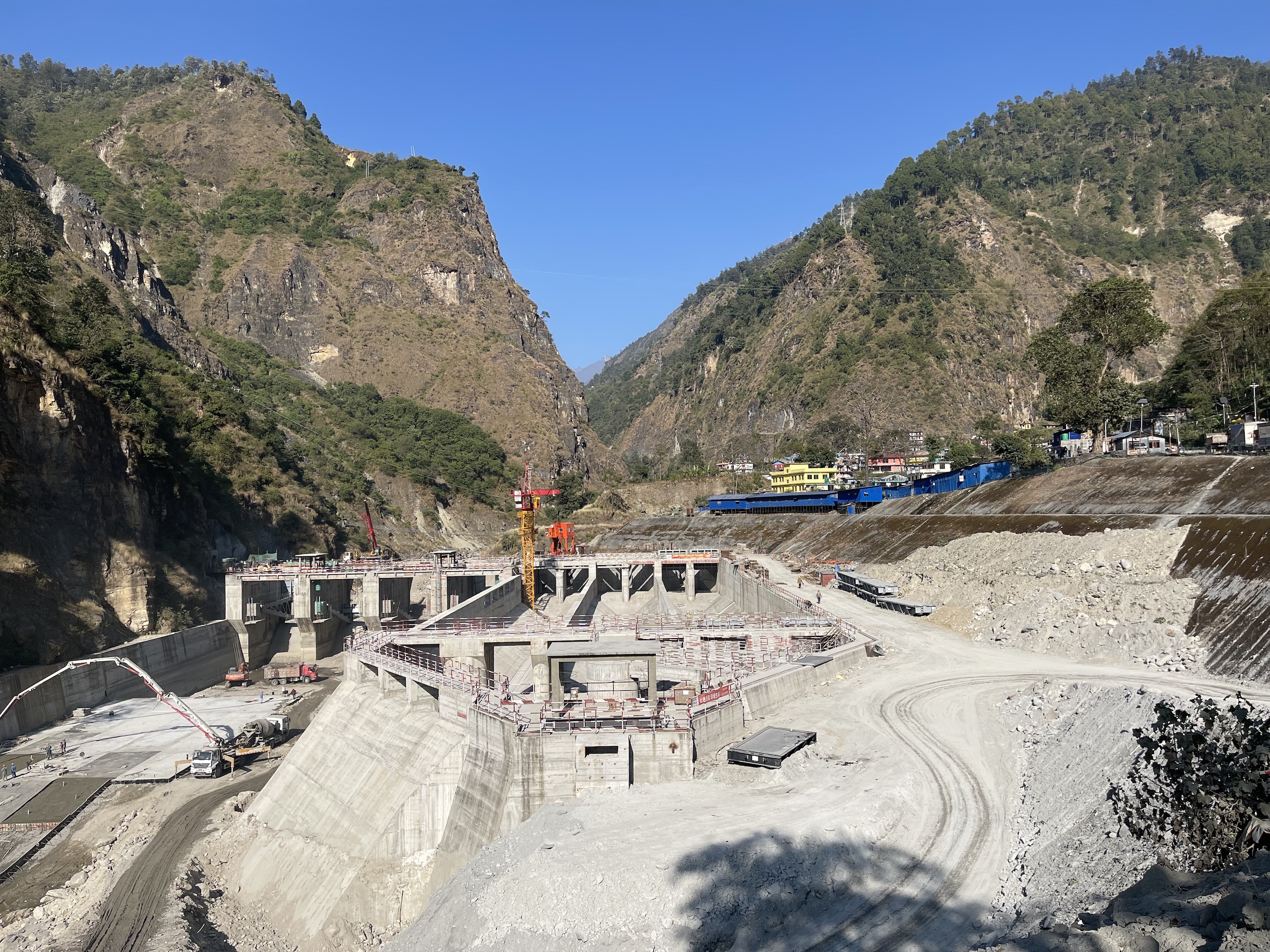 A hydropower project being built across a river