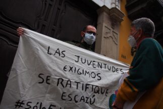 <p>“The youth demand the ratification of Escazú,” reads a banner held by an activist in front of Peru’s Ministry of Foreign Affairs in August 2022. Despite Peru signing the Escazú Agreement in 2018, its ratification has not been discussed in the national congress (Image: Alamy)</p>