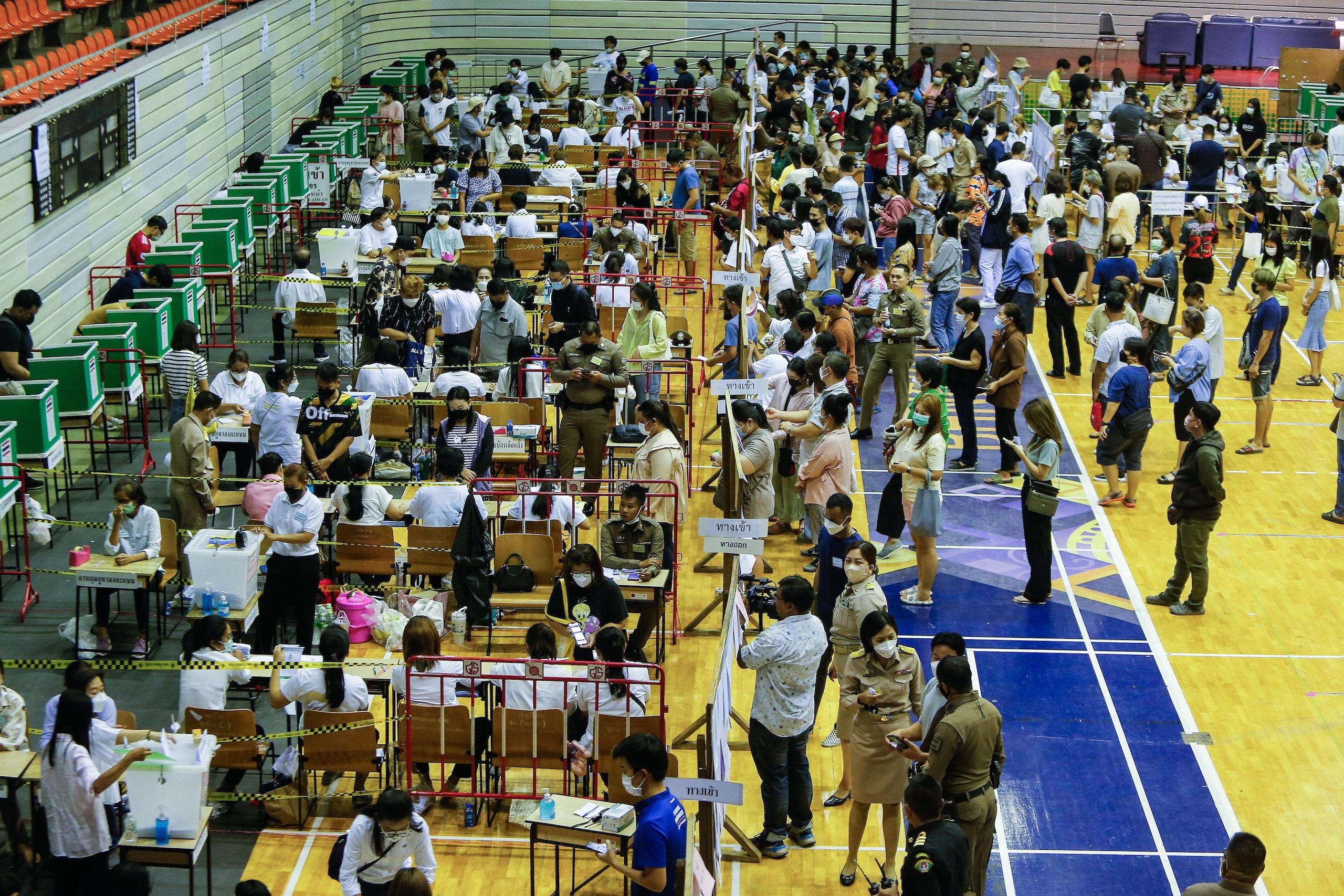 People casting their ballots at a polling station in Bangkok, May 2023