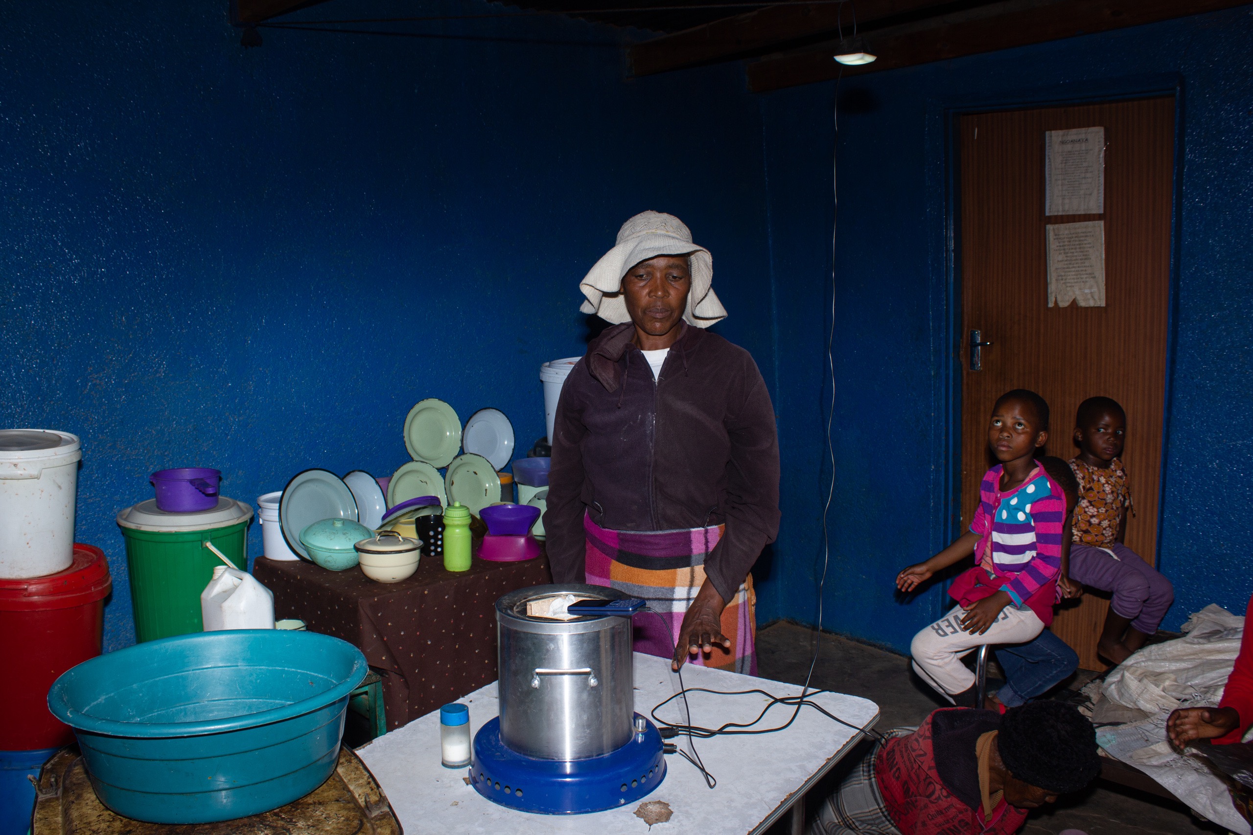 a woman standing in front of the dinning table