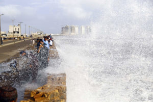 sea spray over sea wall during cyclone Biparjoy in Karachi