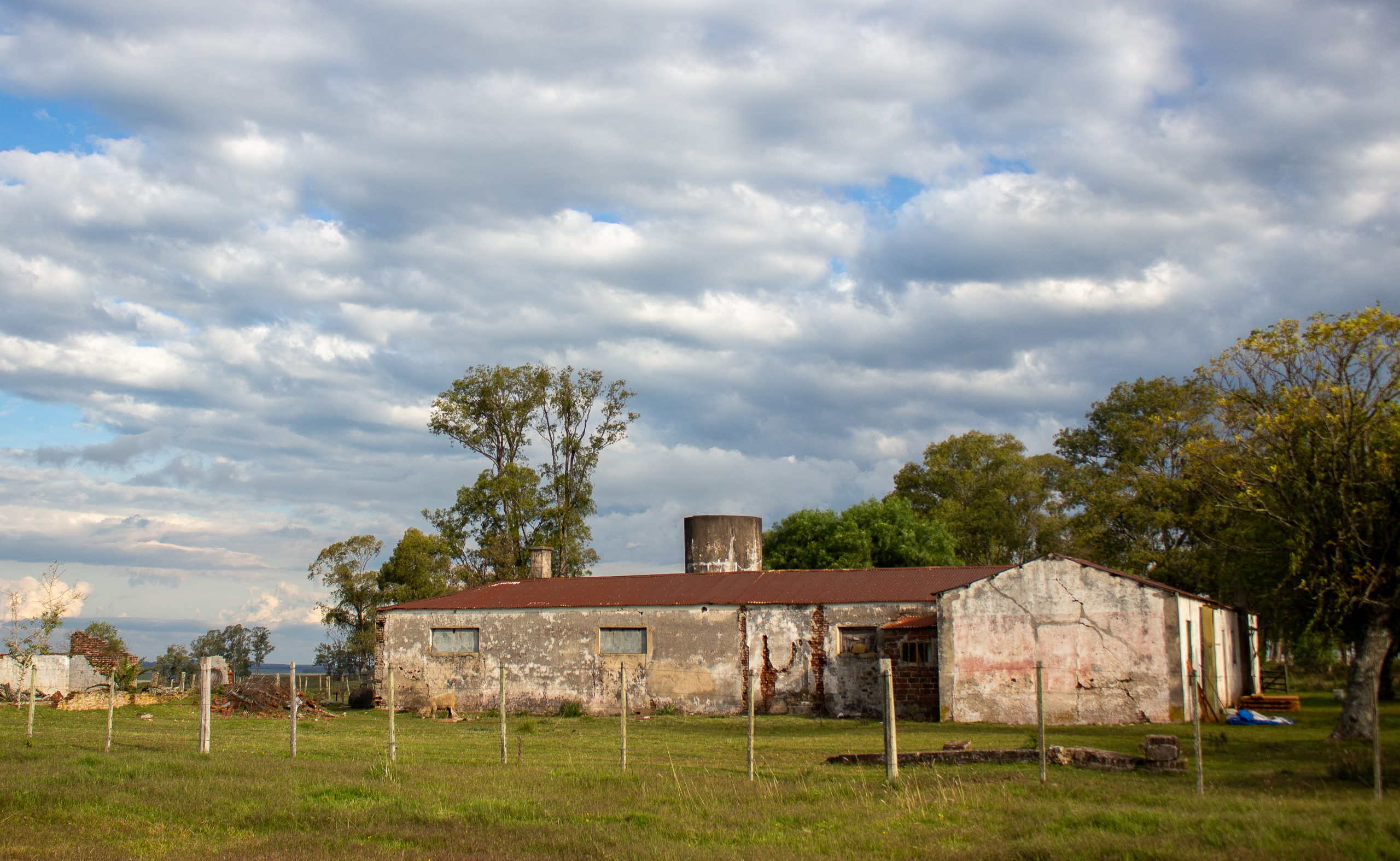concrete building under cloudy sky