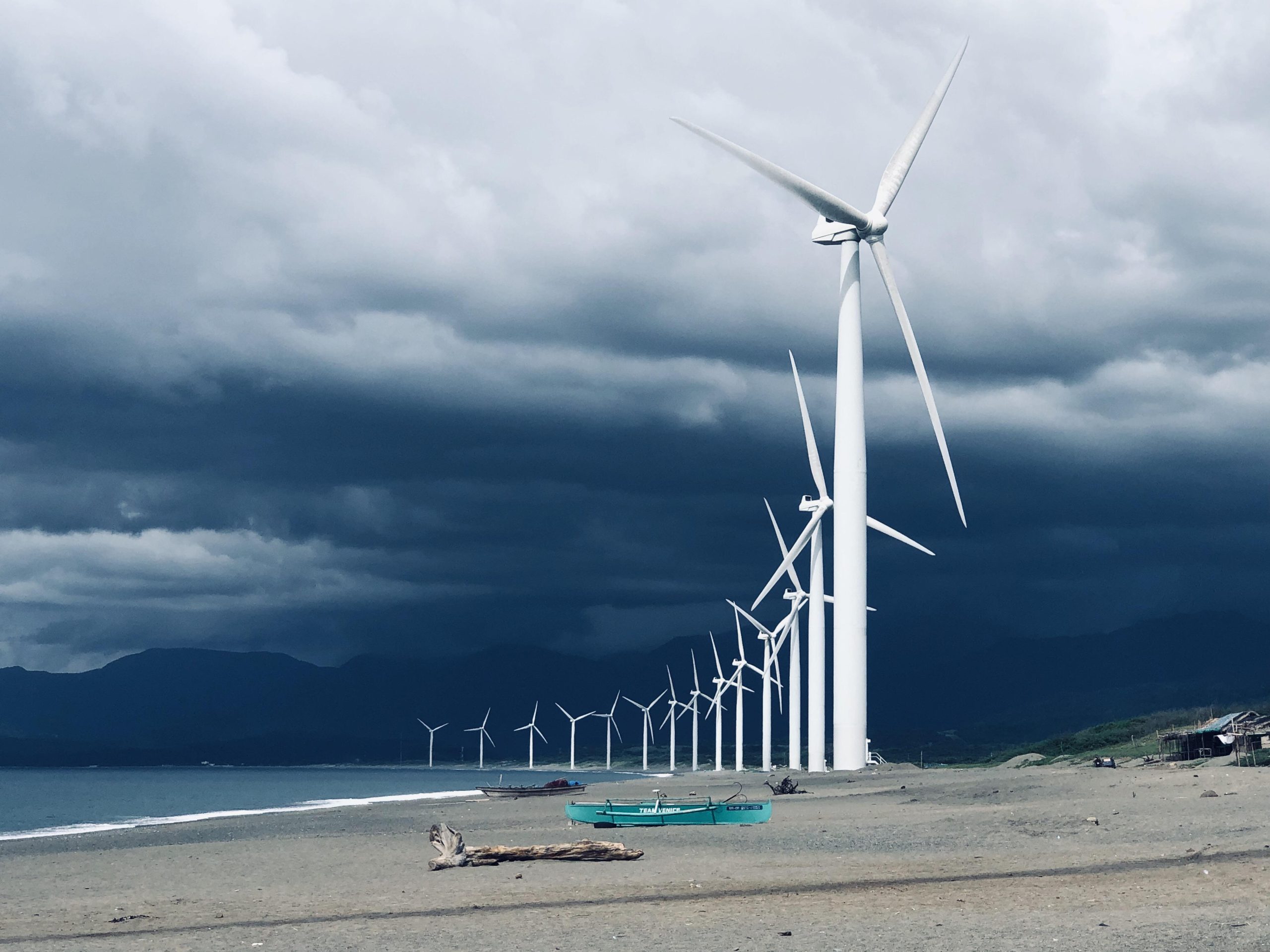 <p>The Bangui wind farm in Ilocos Norte, northern Philippines (Image: Sherbien Dacalanio / Alamy)</p>