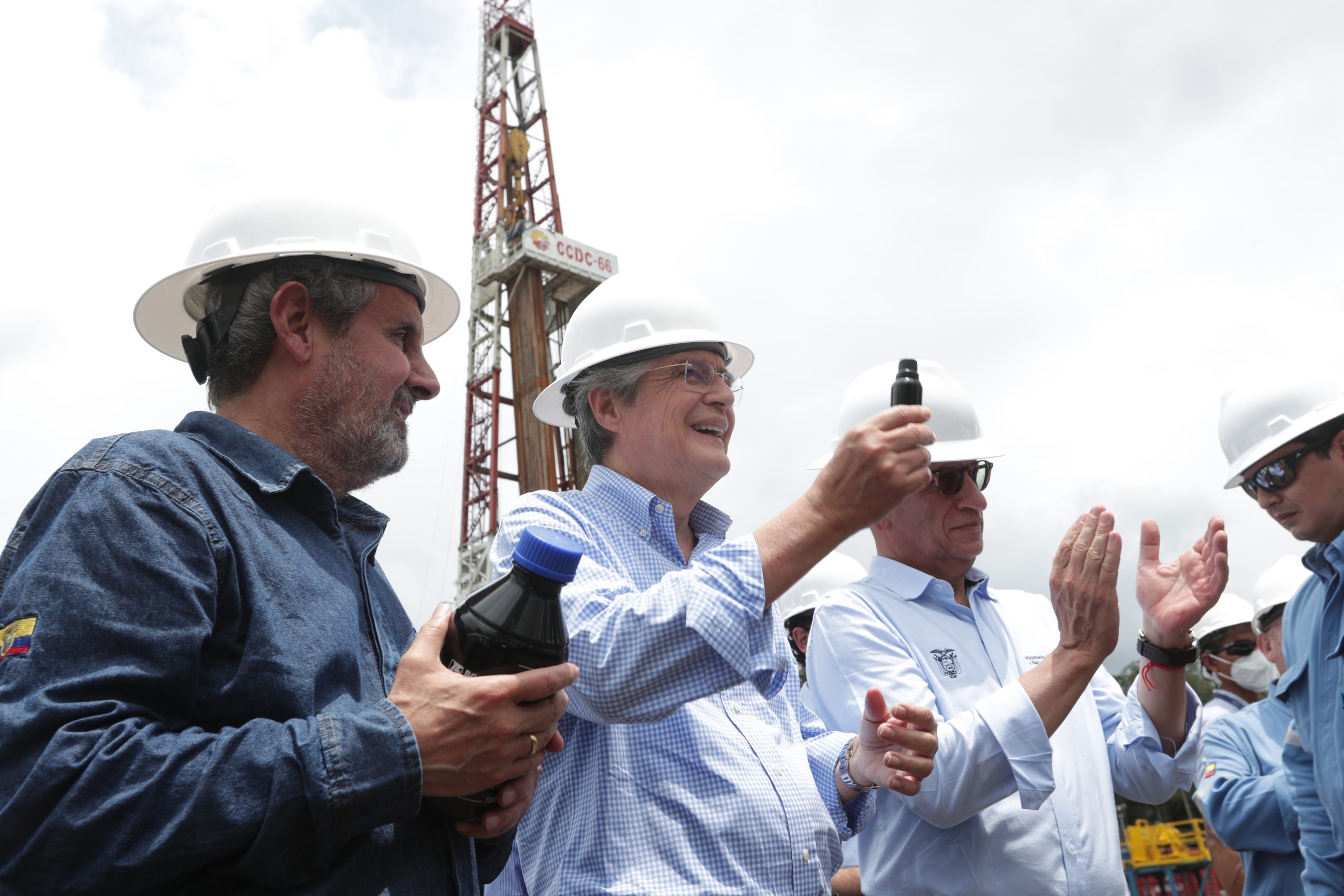 president Guillermo Lasso and other men wearing hard hats