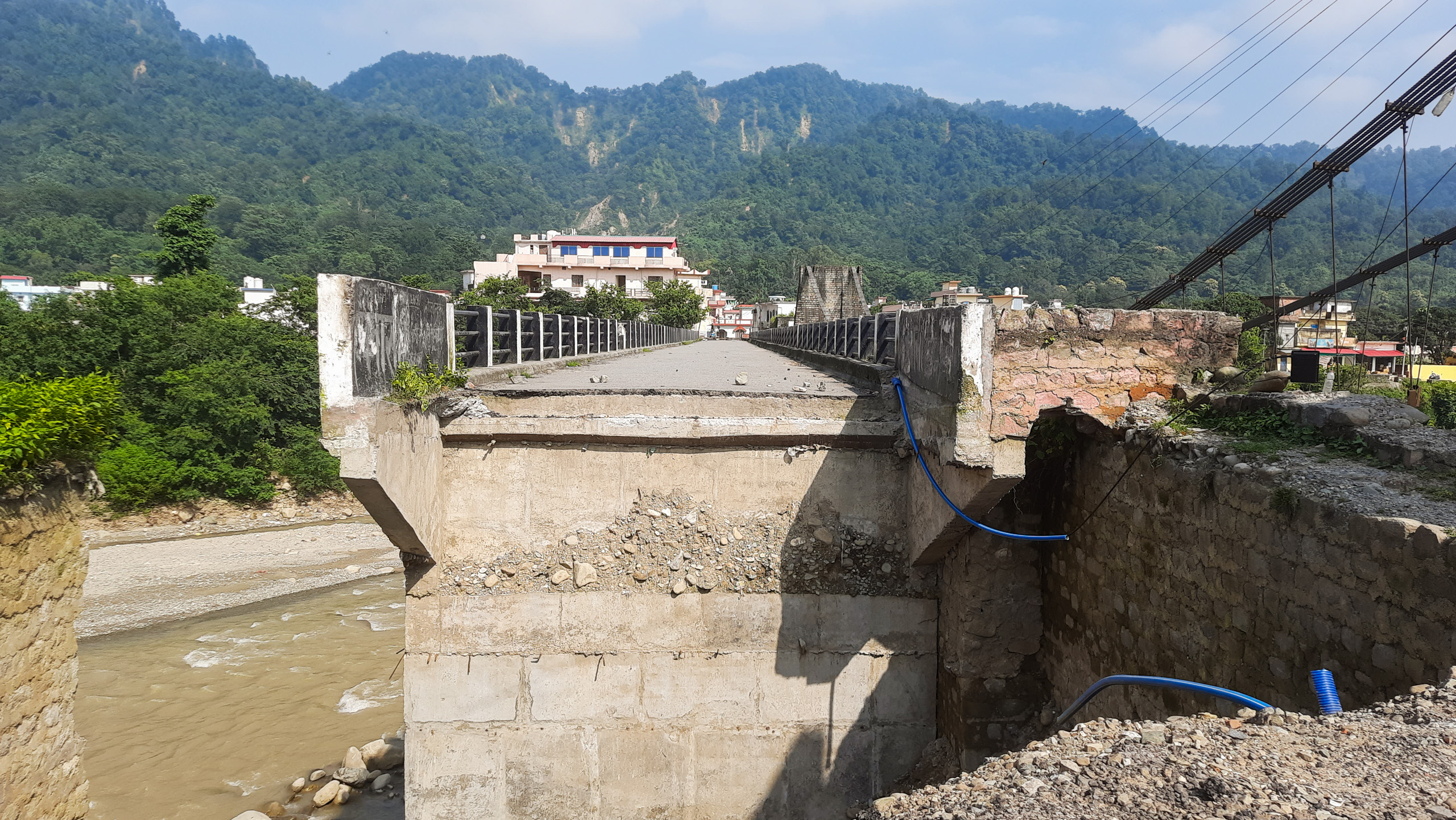 Damaged bridge in a mountainous area