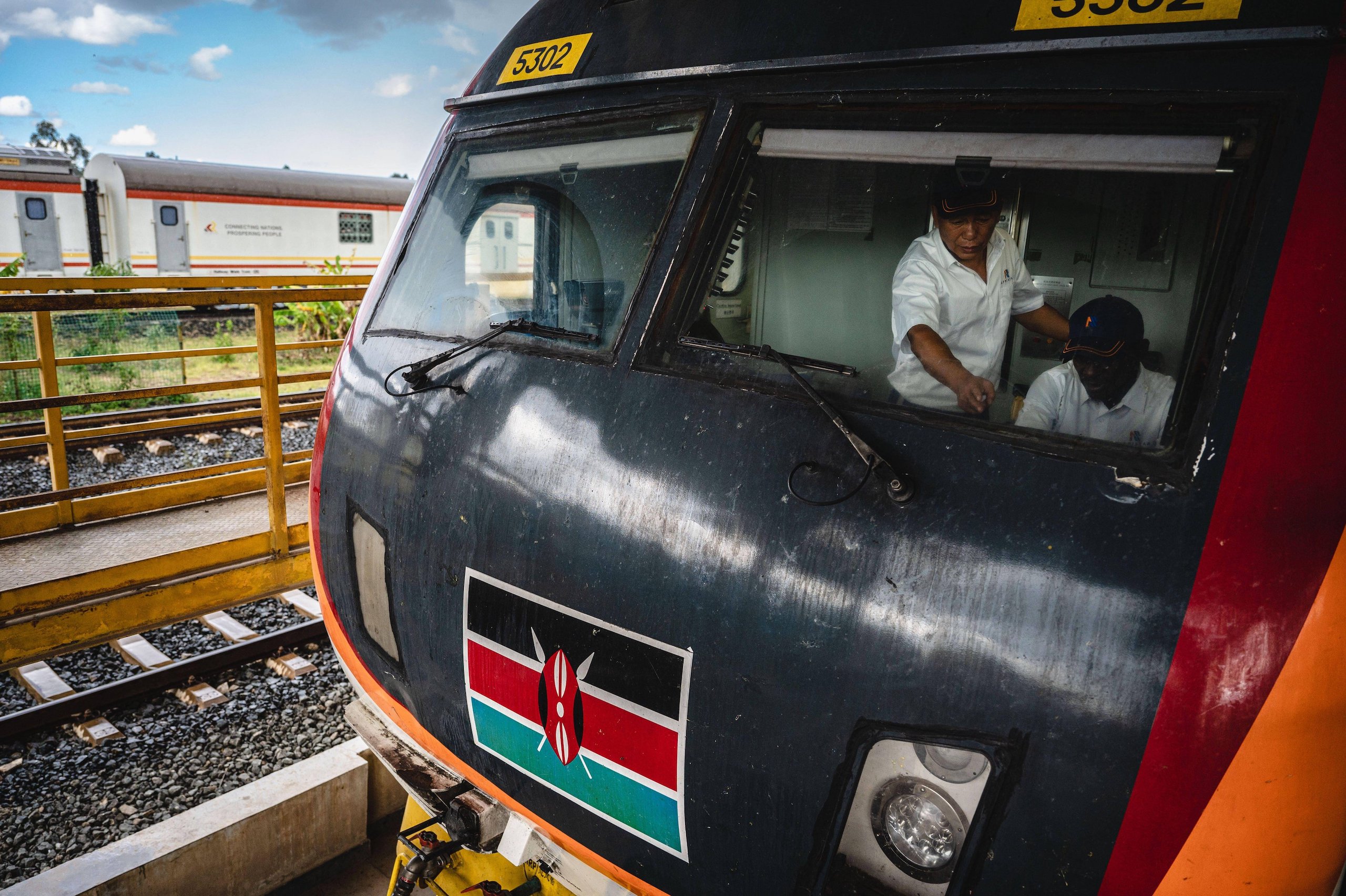 Two men in the operation room of a train