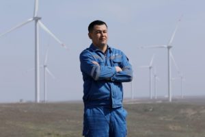 <p>An engineer poses before turbines at the Zhanatas wind farm, Kazakhstan, 17 May 2023. It was in the central Asian country, ten years ago, that Xi Jinping announced what would become the Belt and Road Initiative. (Image: Alamy)</p>