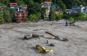 <p>These construction vehicles were covered in debris during flash floods caused by the South Lhonak glacial lake outburst flood in northeast India, 4 October 2023 (Image: Sipa US / Alamy Live News)</p>