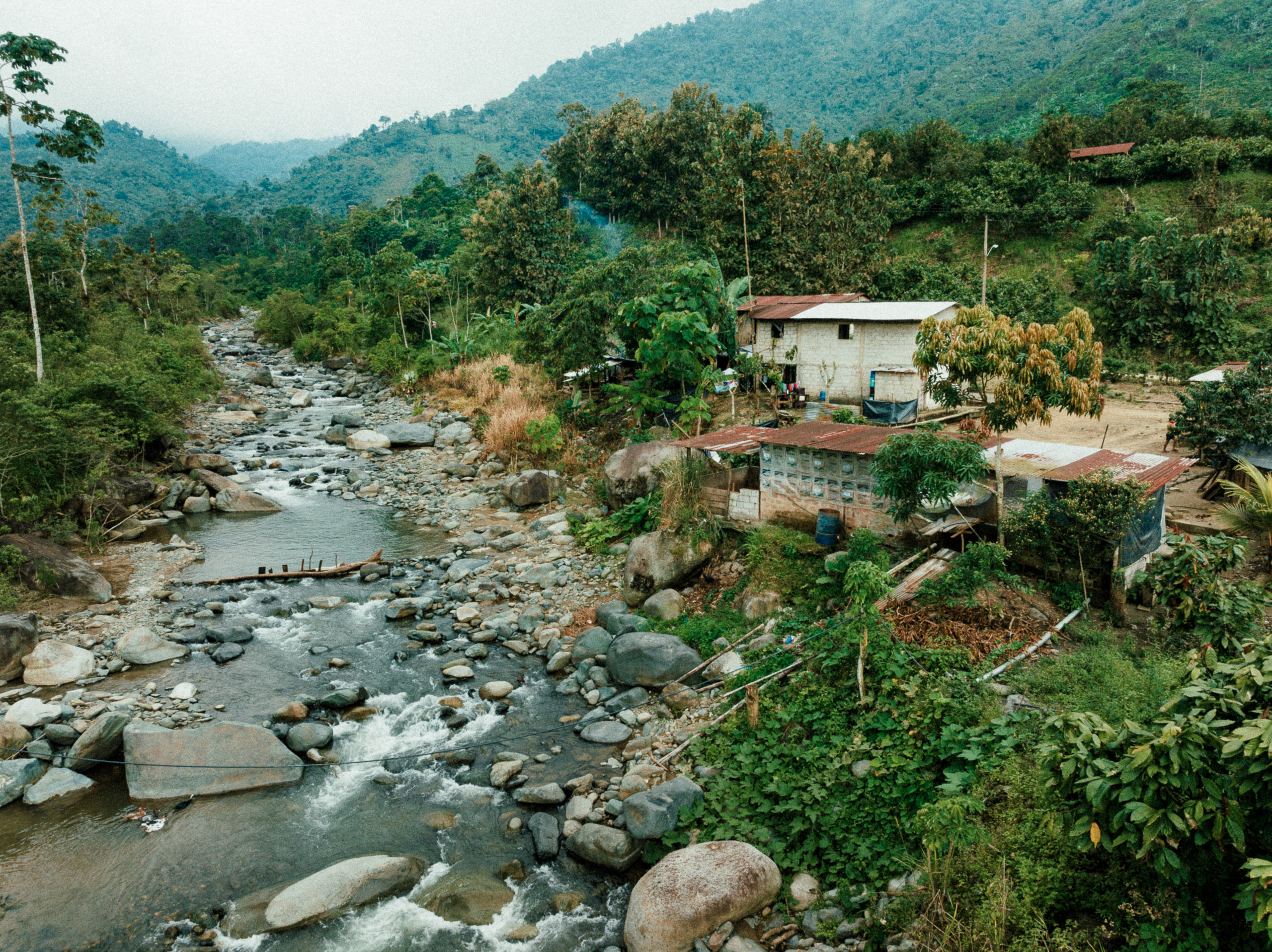 house at the edge of riverbank