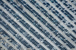 <p>Electric vehicles lined up at a Chang’an Automobile distribution centre in Chongqing, October 2023. China’s EV exports grew by 122% year-on-year in the first three months of 2023. (Image: Alamy)</p>