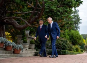 <p>Chinese President Xi Jinping and his US counterpart Joe Biden talk on the sidelines of the APEC conference in San Francisco on 15 November (Doug Mills / The New York Times via Alamy)</p>