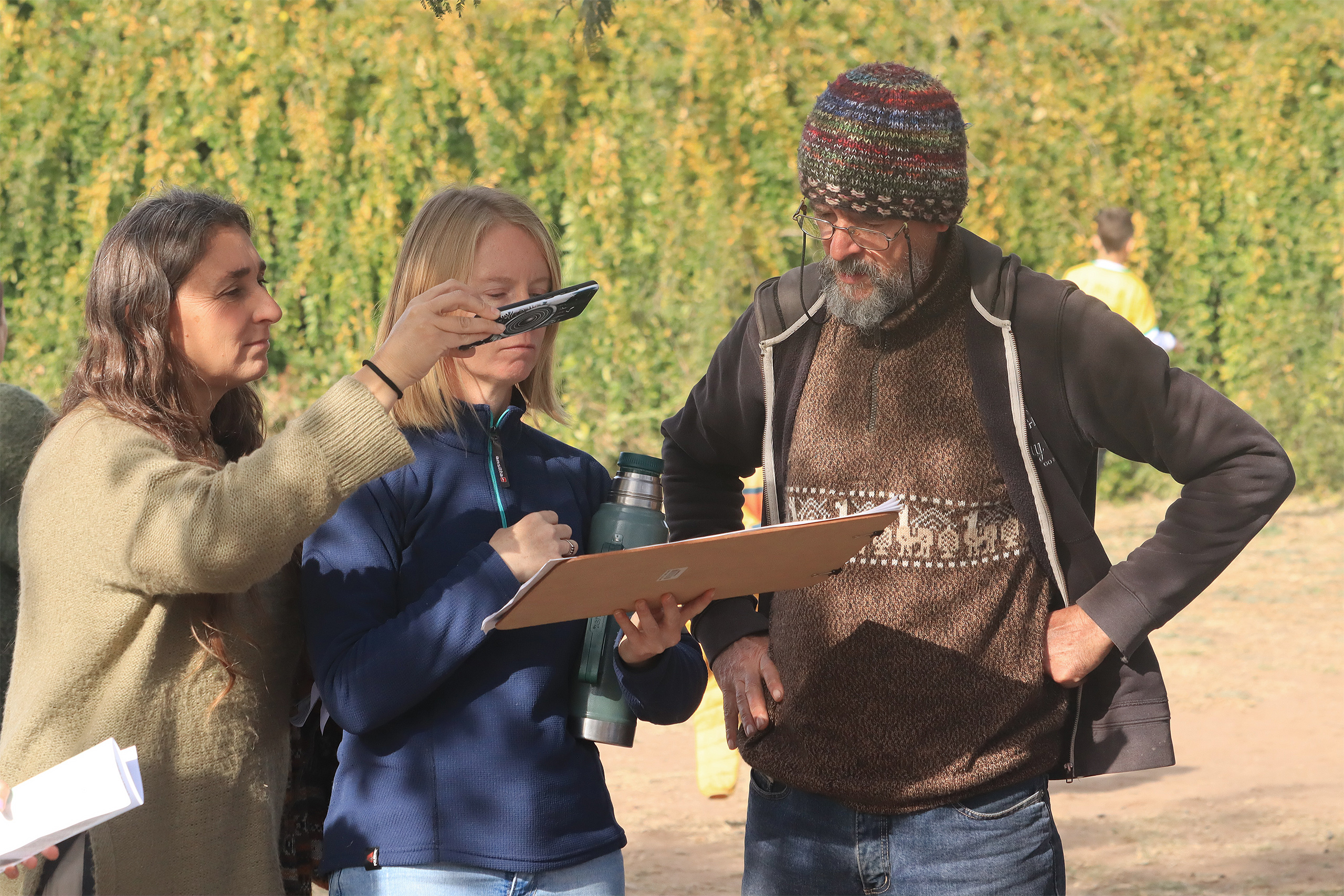People trying to identify native forest species